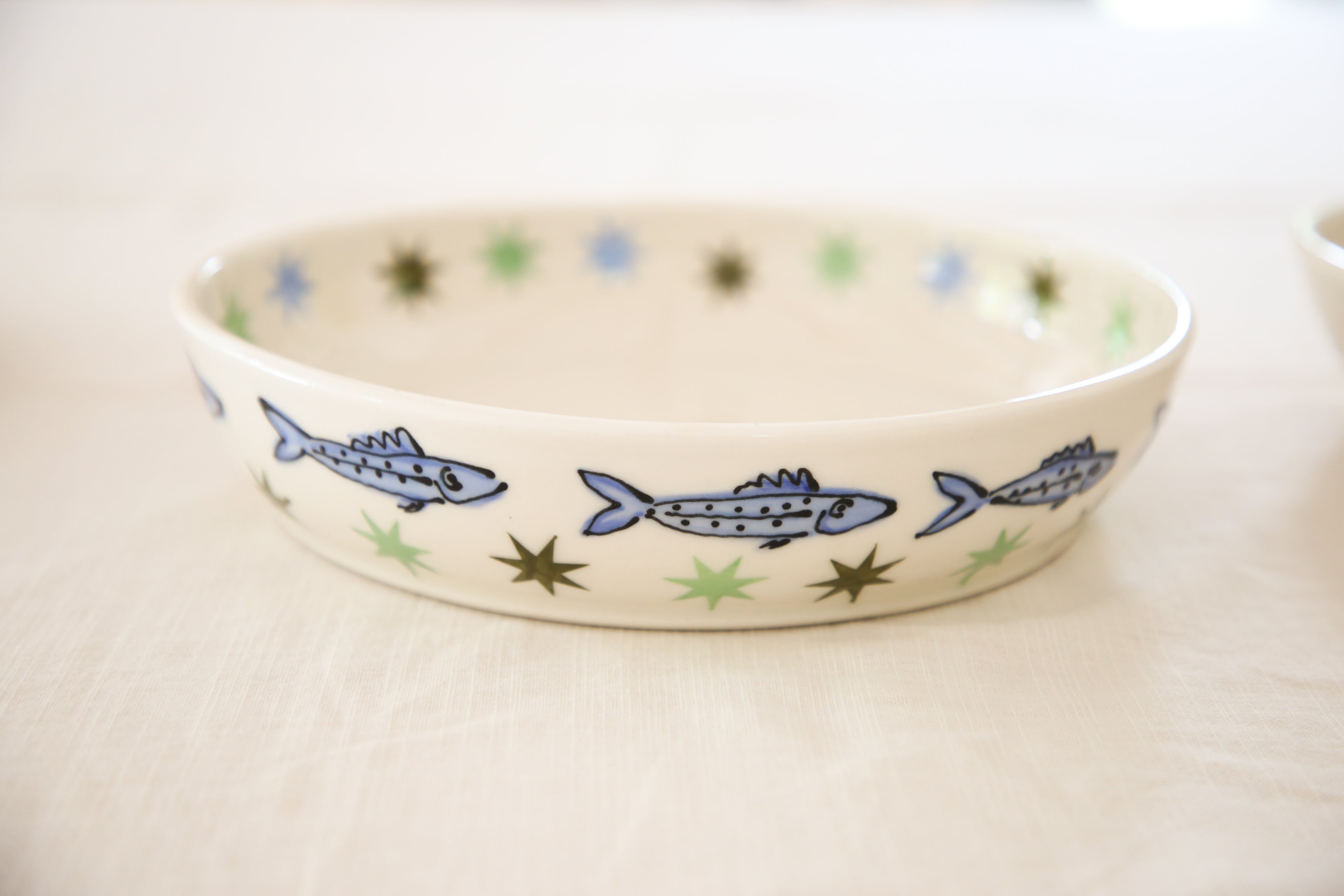 Shallow sardine serving bowl